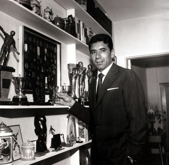Sport. Football. January 1963. Brazilian international Nilton Santos stands alongside some of his medals and trophies accumulated in a long career. He had a long international career for Brazil playing in the 1954, 1958 and 1962 World Cups and was a membe