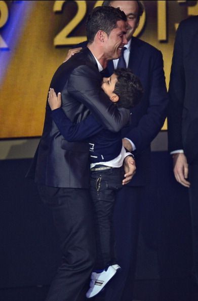 Real Madrid's Portuguese forward Cristiano Ronaldo celebrates with his son Cristiano Ronaldo Junior 