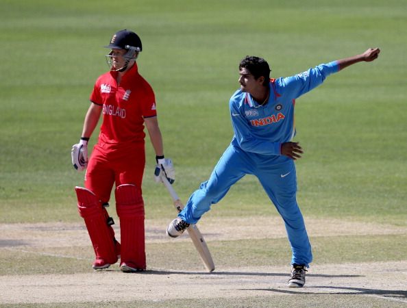 DUBAI, UNITED ARAB EMIRATES - FEBRUARY 22: Deepak Hooda of India bowls during the ICC U19 Cricket World Cup 2014 Quarter Final match between England and India at the Dubai Sports City Cricket Stadium on February 22, 2014 in Dubai, United Arab Emirates.  (Photo by Francois Nel - IDI/IDI via Getty Images)