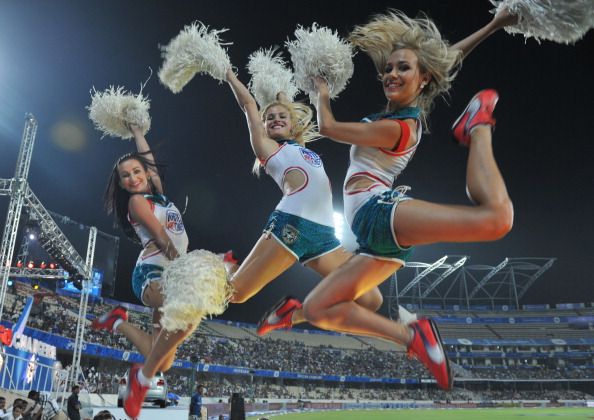 Cheerleaders perform prior to the start of the IPL Twenty20 cricket match between Deccan Chargers and Kings XI Punjab at the Rajiv Gandhi International Stadium in Hyderabad on May 8, 2012. RESTRICTED TO EDITORIAL USE. MOBILE USE WITHIN NEWS PACKAGE.  AFP PHOTO / Noah SEELAM        (Photo credit should read NOAH SEELAM/AFP/GettyImages)