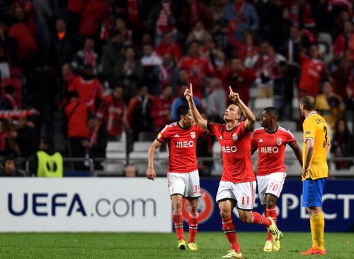 Benfica's Brazilian forward Rodrigo Lima (2ndL) celebrates after scoring a goal during the UEFA Europa League semifinal first leg football match SL Benfica vs Juventus at the Luz stadium in Lisbon 