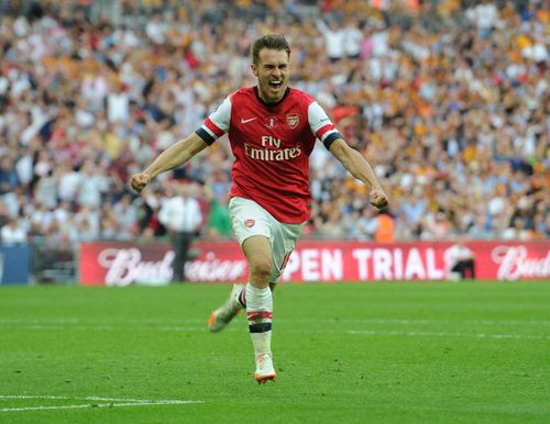 Aaron Ramsey celebrates after scoring the winner in the FA Cup final to hand Arsenal a trophy after 9 years