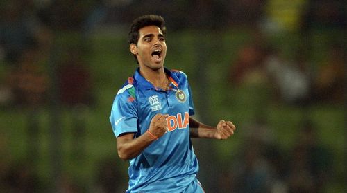 India cricketer Bhuvneshwar Kumar celebrates the wicket of South Africa batsman Quinton de Kock during the ICC World Twenty20 cricket tournament second first semi-final match between India and South Africa in The Sher-e-Bangla National Cricket Stadium in Dhaka on April 4, 2014. AFP PHOTO/Prakash SINGH        (Photo credit should read PRAKASH SINGH/AFP/Getty Images)