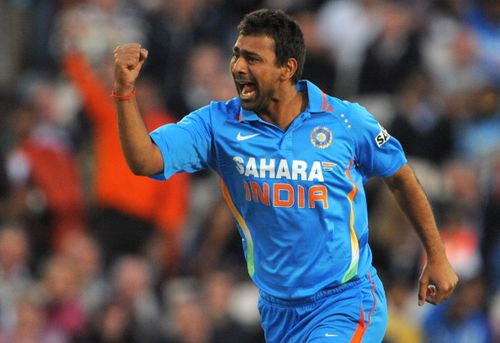 India's Praveen Kumar celebrates after t