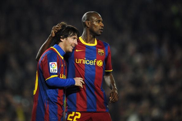 Eric Abidal and Messi