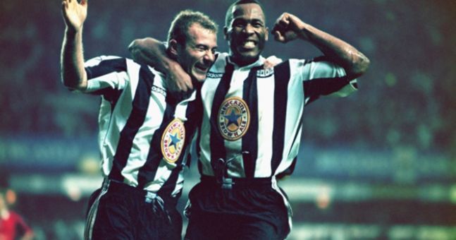 Newcastle strikers Alan Shearer (l) and Les Ferdinand celebrate a goal during the Premiership match between Newcastle United and Manchester United at St Jame&#039;s Park on October 20, 1996 in Newcastle, England. Newcastle won the game 5-0. 