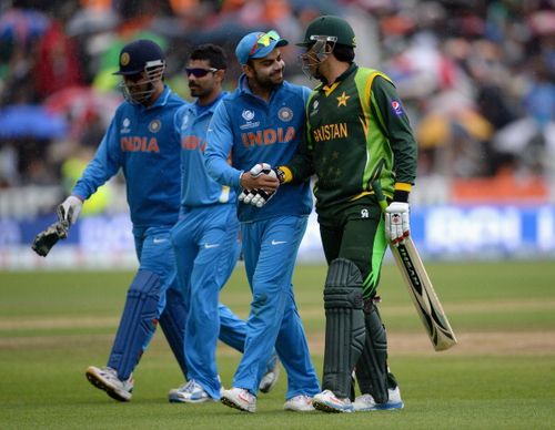 MS Dhoni, Ravindra Jadeja, Virat Kohli and Misbah-ul-Haq during the ICC Champions Trophy match in 2013