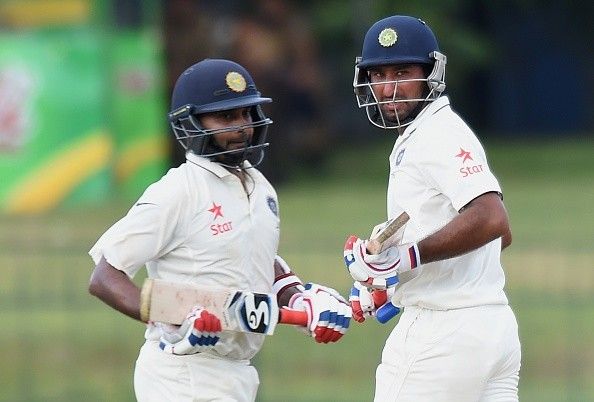 Amit Mishra Cheteshwar Pujara