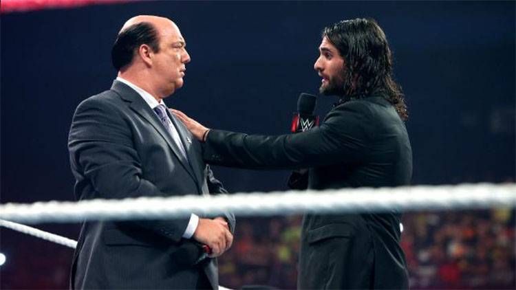 Seth Rollins with Paul Heyman