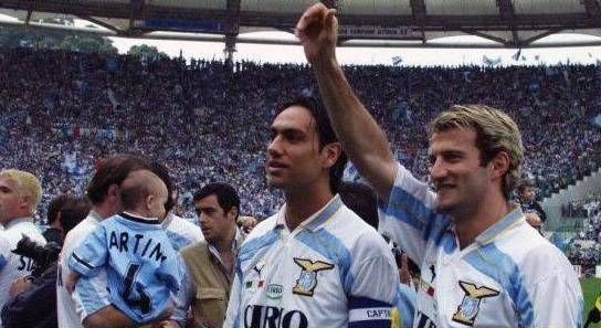 Lazio captain Alessandro Nesta and Giuseppe Favalli celebrating their second Scudetto win