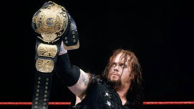 Taker and the belt just donât go together