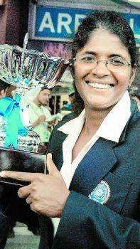 Mamatha displays the 2004 Womens Asia Cup trophy with pride