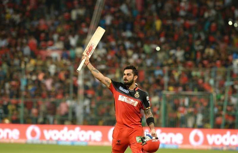 Virat Kohli acknowledges the crowd after one of his five IPL hundreds