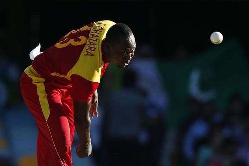 Zimbabwe's Tendai Chatara bowls during the Cricket World Cup match against Pakistan at the Gabba in Brisbane March 1, 2015. REUTERS/Jason Reed/Files