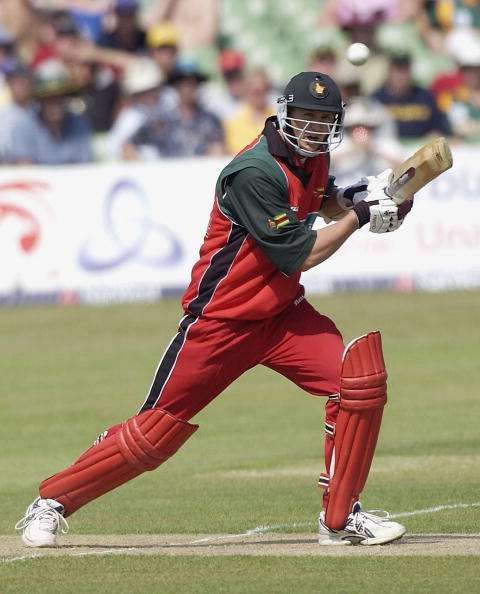 CANTERBURY, ENGLAND - JUNE 29:  Douglas Marillier of Zimbabwe hits out during the third match of the NatWest one day triangular series between South Africa and Zimbabwe at Canterbury Cricket Ground on June 29, 2003 in London. (Photo by Paul Gilham/Getty Images)