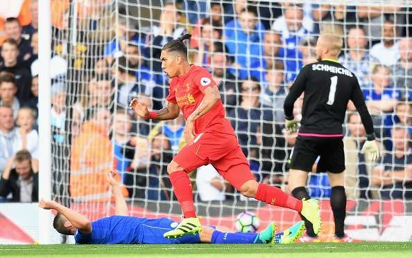 LIVERPOOL, ENGLAND - SEPTEMBER 10:  Roberto Firmino of Liverpool celebrates scoring his sides first goal  during the Premier League match between Liverpool and Leicester City at Anfield on September 10, 2016 in Liverpool, England.  (Photo by Michael Regan/Getty Images)