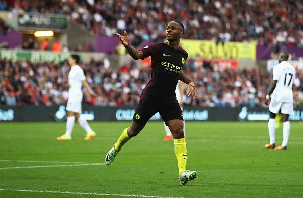 SWANSEA, WALES - SEPTEMBER 24: Raheem Sterling of Manchester City celebrates scoring his sides third goal  during the Premier League match between Swansea City and Manchester City at the Liberty Stadium on September 24, 2016 in Swansea, Wales.  (Photo by Michael Steele/Getty Images)