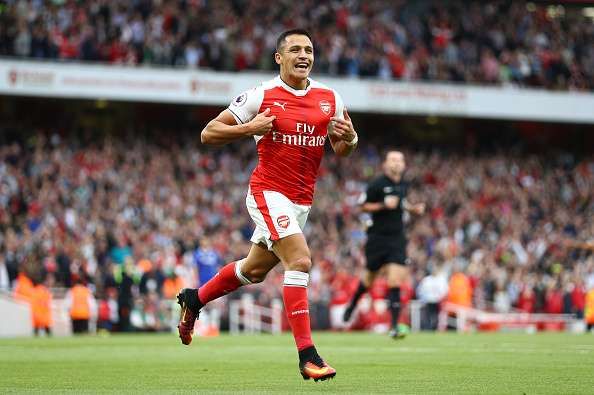 LONDON, ENGLAND - SEPTEMBER 24:  Alexis Sanchez of Arsenal celebrates scoring his sides first goal during the Premier League match between Arsenal and Chelsea at the Emirates Stadium on September 24, 2016 in London, England.  (Photo by Paul Gilham/Getty Images)