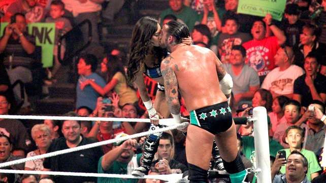 AJ Lee kisses her future real life husband CM Punk