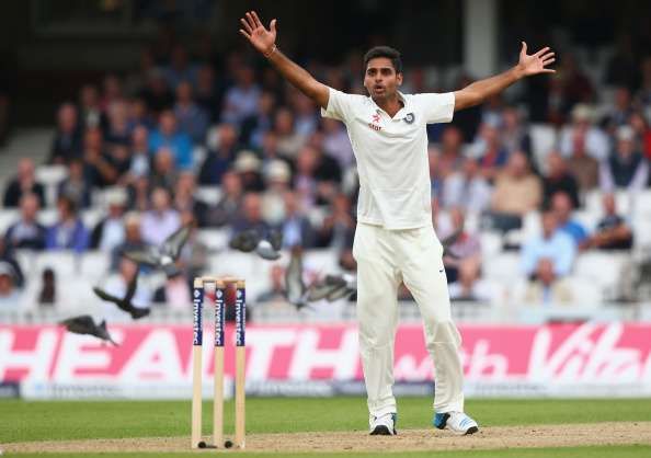 LONDON, ENGLAND - AUGUST 15:  Bhuvneshwar Kumar unsuccessfully appeals for the wicket of Alastair Cook of England during day one of the 5th Investec Test match between England and India at The Kia Oval on August 15, 2014 in London, England.  (Photo by Paul Gilham/Getty Images)