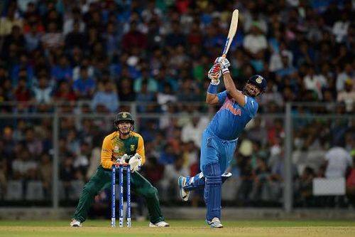 MUMBAI, INDIA - MARCH 12:  Suresh Raina of India bats during the ICC Twenty20 World Cup warm up match between India and South Africa at Wankhede Stadium on March 12, 2016 in Mumbai, India.  (Photo by Gareth Copley/Getty Images,)