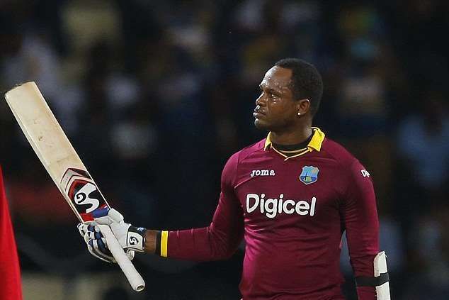 Marlon Samuels with his SG bat