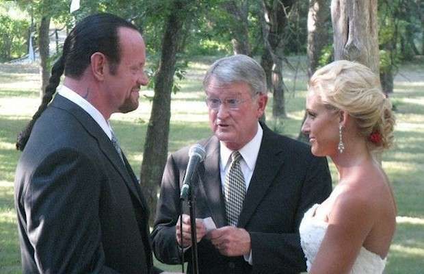 The Undertaker and Michelle McCool being married in a solemn ceremony in Houston, Texas