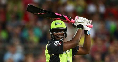 Andre Russell with the black and pink bat 