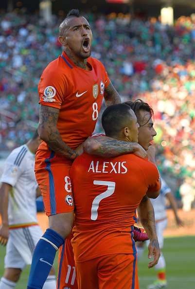 SANTA CLARA, CA - JUNE 18:  Eduardo Vargas #11, Alexis Sanchez #7 and Arturo Vidal #8 of Chile celebrate after Vargas scored a goal against Mexico during the 2016 Copa America Centenario Quarterfinals match play between Mexico and Chile at Levi's Stadium on June 18, 2016 in Santa Clara, California.  (Photo by Thearon W. Henderson/Getty Images)