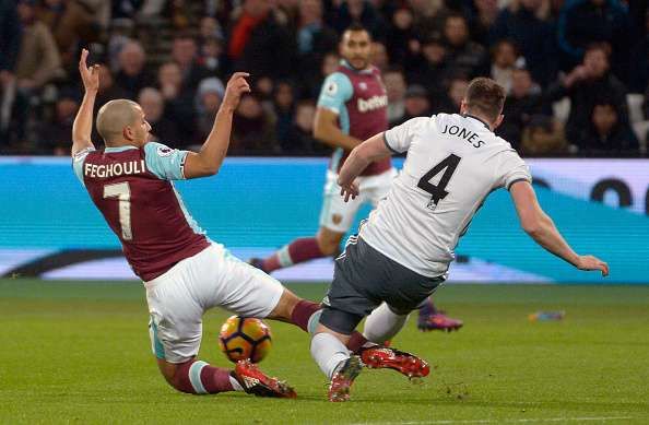 Mike Dean red card Sofiane Feghouli Phil Jones