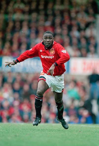 English footballer Andy Cole playing for Manchester United against Ipswich Town in an English Premier League match at Old Trafford, Manchester, 4th March 1995. Manchester United won the match 9-0. (Photo by Anton Want/Getty Images)