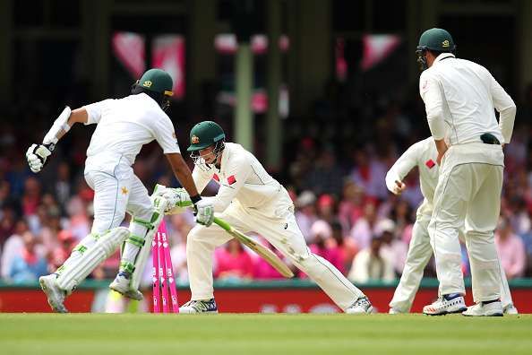 Azhar Ali is dismissed with his bat in the air while trying to complete a run