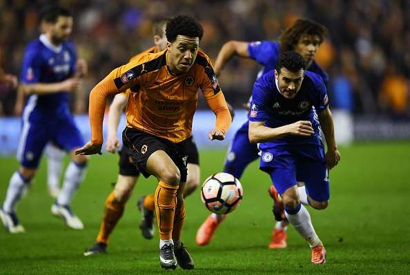 WOLVERHAMPTON, ENGLAND - FEBRUARY 18: Wander Helder Costa of Wolves (L) attempts to take it past Pedro of Chelsea (R) during The Emirates FA Cup Fifth Round match between Wolverhampton Wanderers and Chelsea at Molineux on February 18, 2017 in Wolverhampton, England.  (Photo by Shaun Botterill/Getty Images)