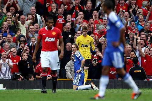 MANCHESTER, ENGLAND - SEPTEMBER 18:  Fernando Torres of Chelsea reacts after missing an open goal during the Barclays Premier League match between Manchester United and Chelsea at Old Trafford on September 18, 2011 in Manchester, England.  (Photo by Clive Brunskill/Getty Images)