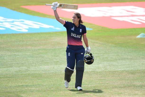 DERBY, ENGLAND - JULY 12: Natalie Sciver of England raises her bat after scoring one hundred runs during the ICC Women&#039;s World Cup 2017 between England and New Zealand at The 3aaa County Ground on July 12, 2017 in Derby, England. (Photo by Nathan Stirk/Getty Images)