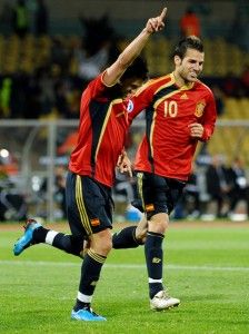 Both David Villa and Fabregas score in the 6-0 win.